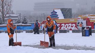 Beijing wakes up to the city's first new snowfall of the Winter Olympics